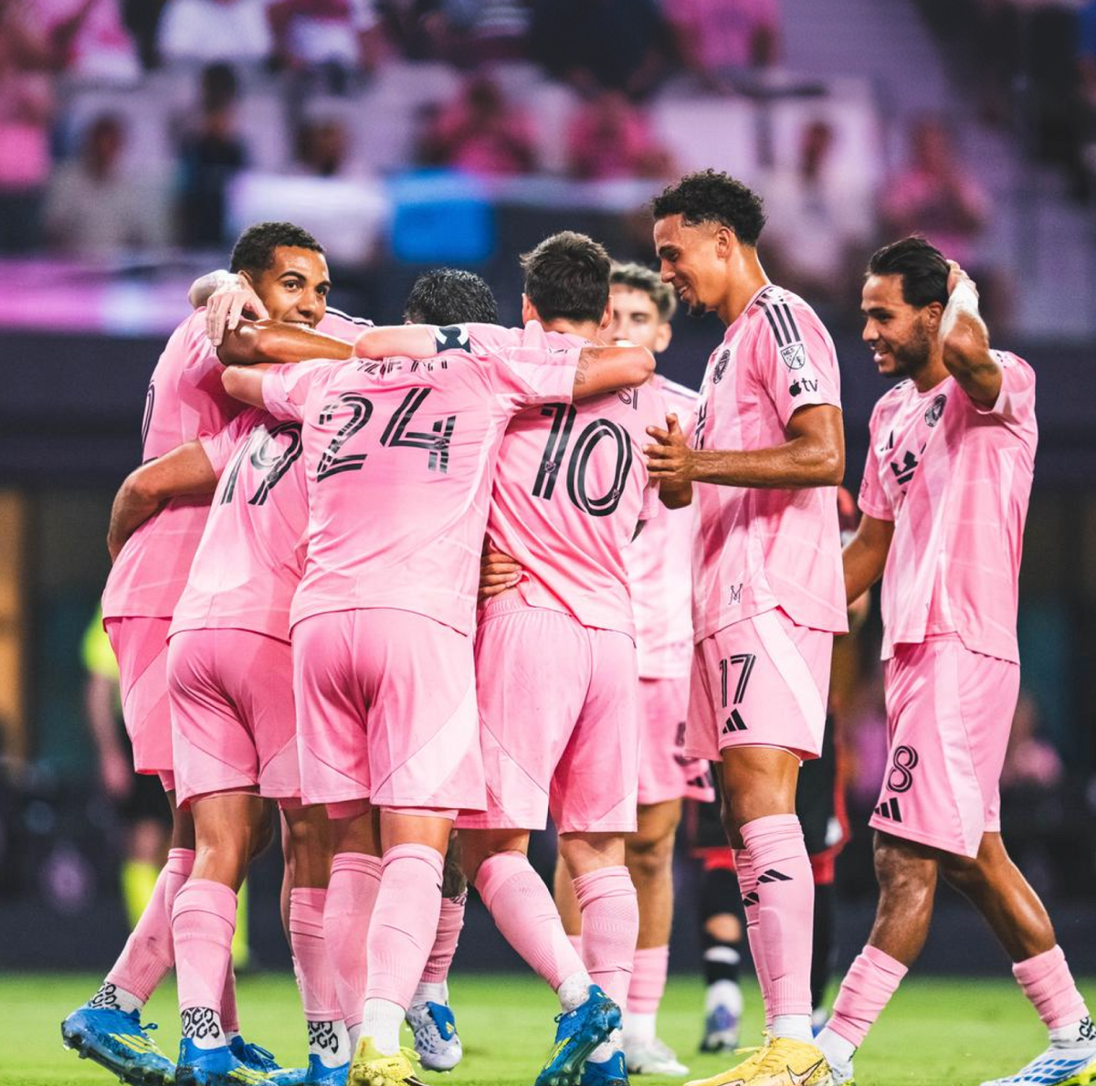 Inter Miami CF team huddle on pitch